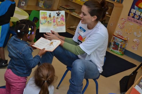 volunteer reading to children