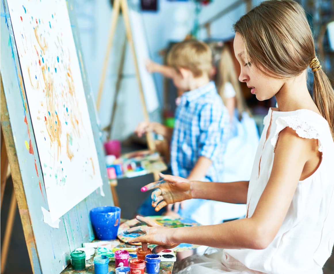 Kids finger painting. 