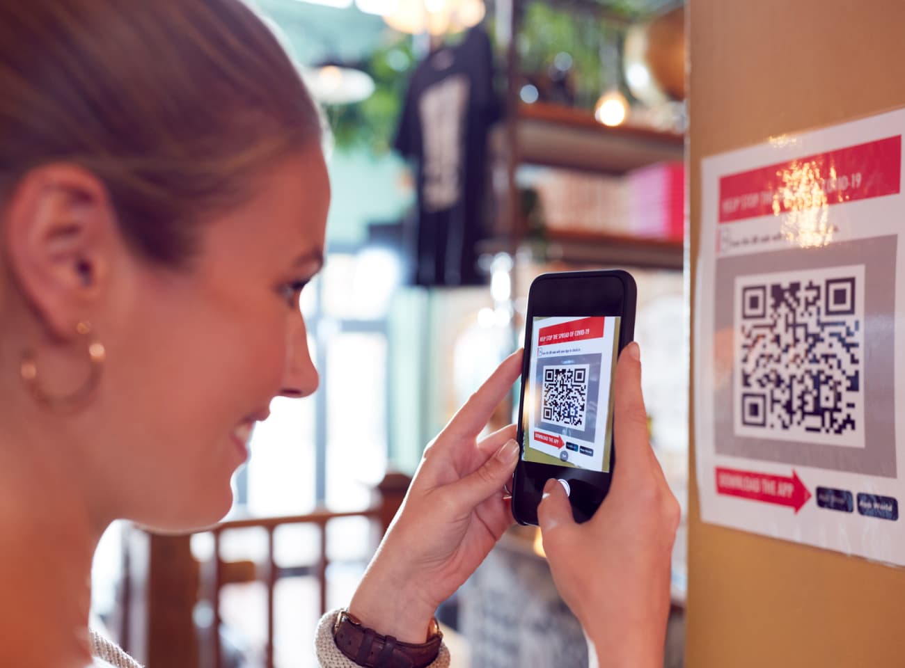 Check-in volunteers using VolunteerHub QR code feature.