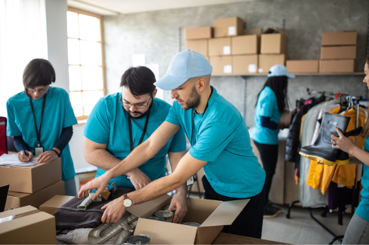 volunteers packing boxes